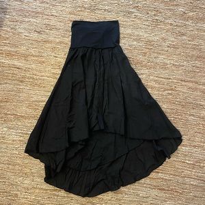 Black asymmetrical skirt.